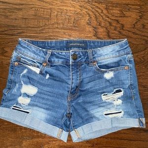 Ripped jean shorts